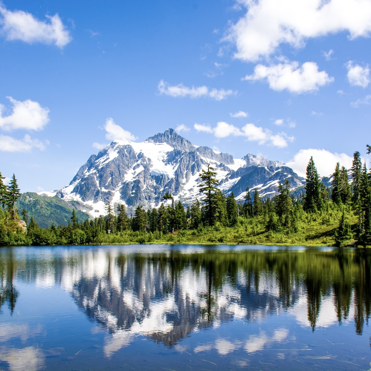 Mount Shuksan reflecting off of a body of water at North Cascades National Park